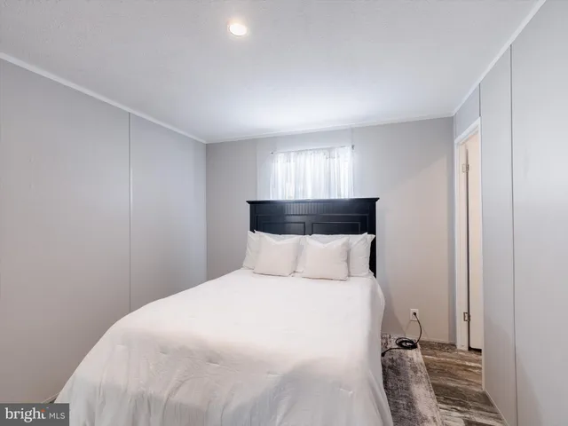 a room with a refrigerator and a cabinets