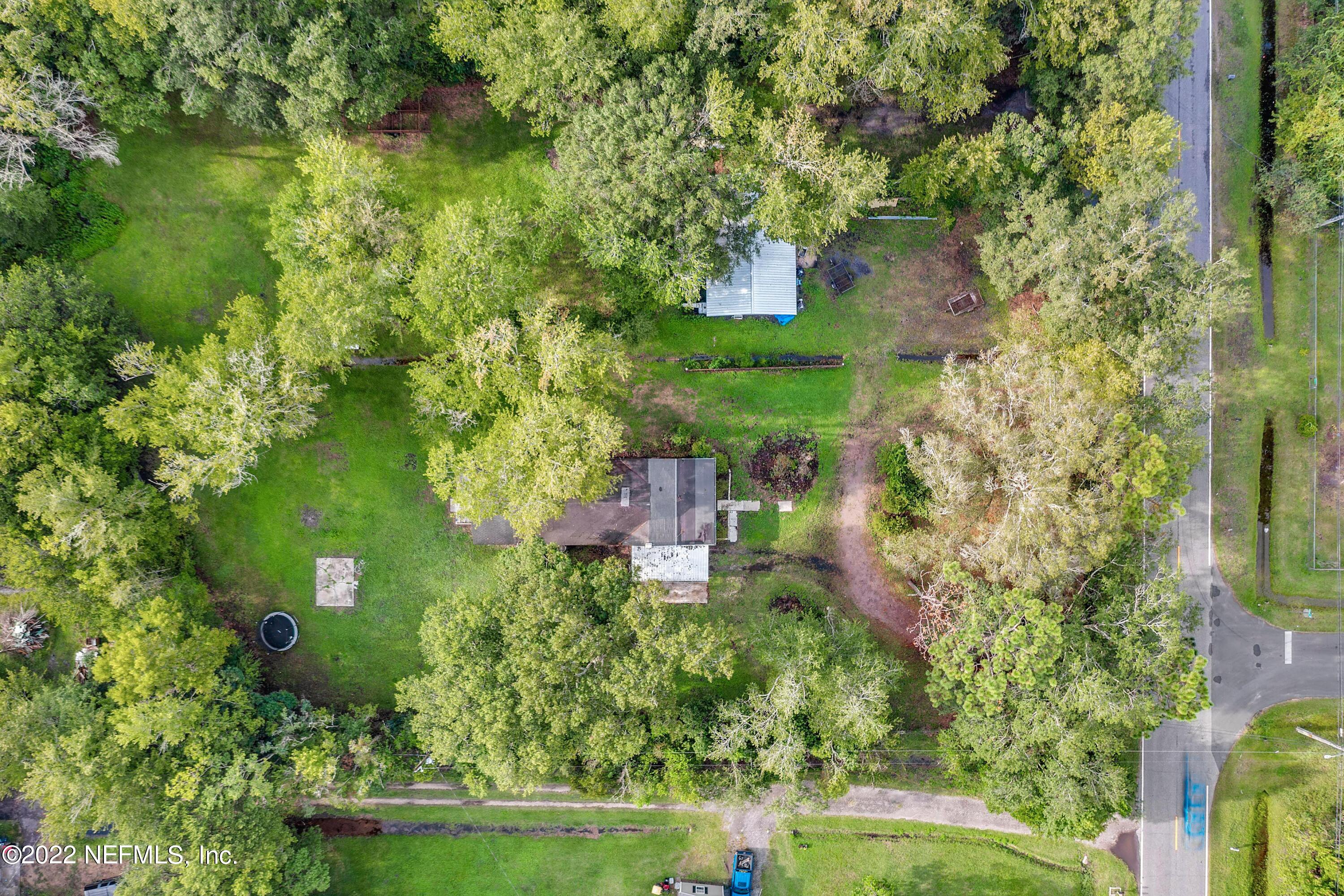 1450 Jones Road Jacksonville, FL 32220 - Photo 1 of 42 Ariel View of House and Detached Garage