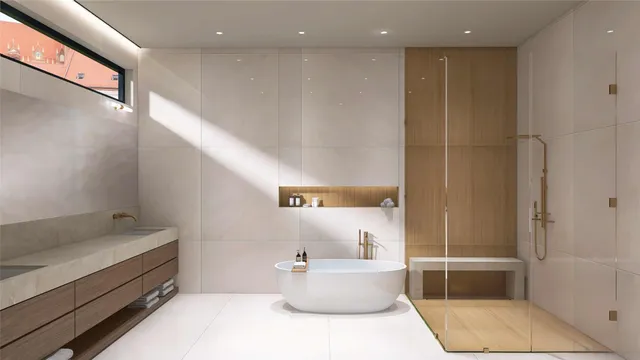a bathroom with a bathtub and sink