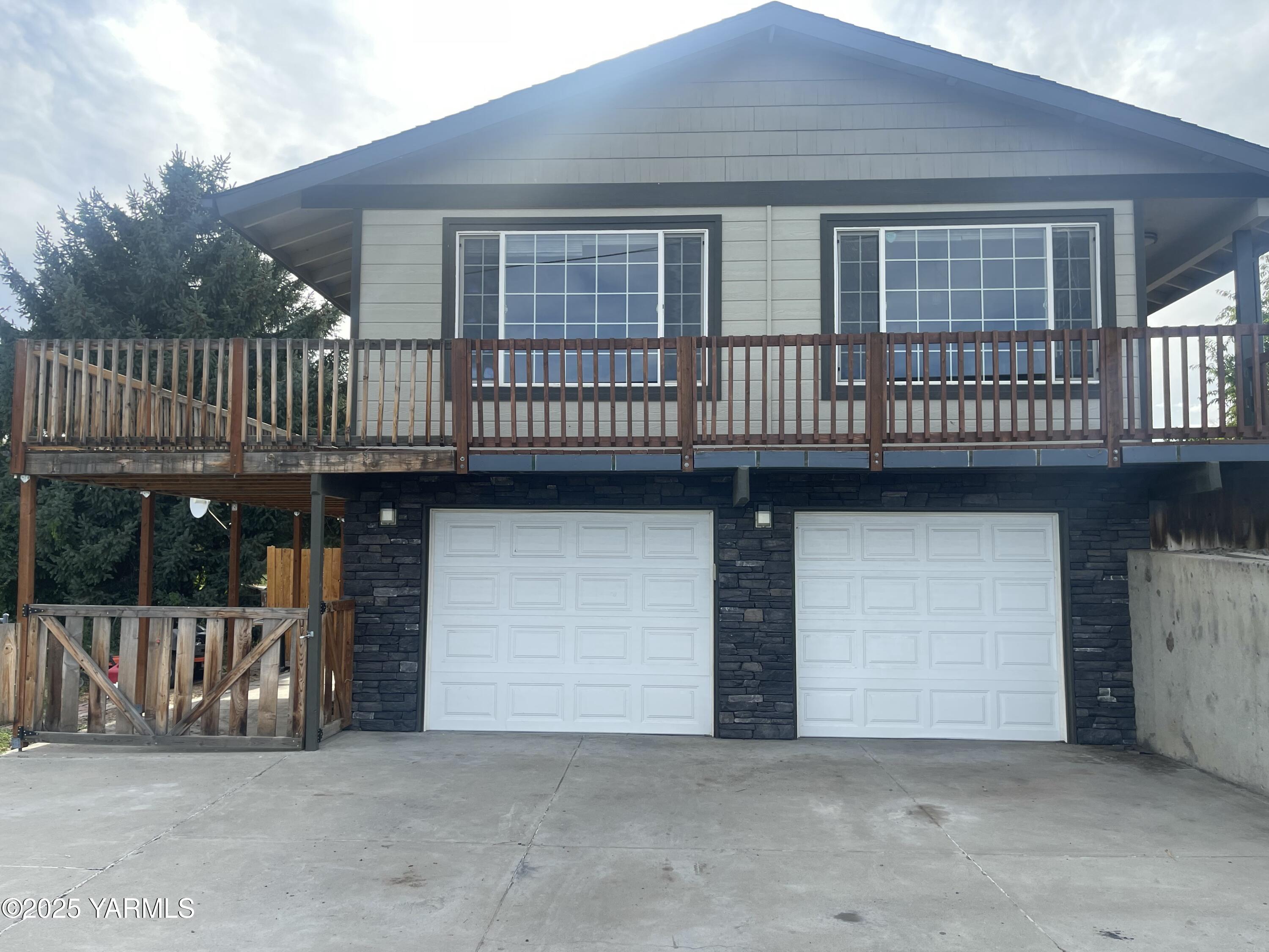 a front view of a house with balcony