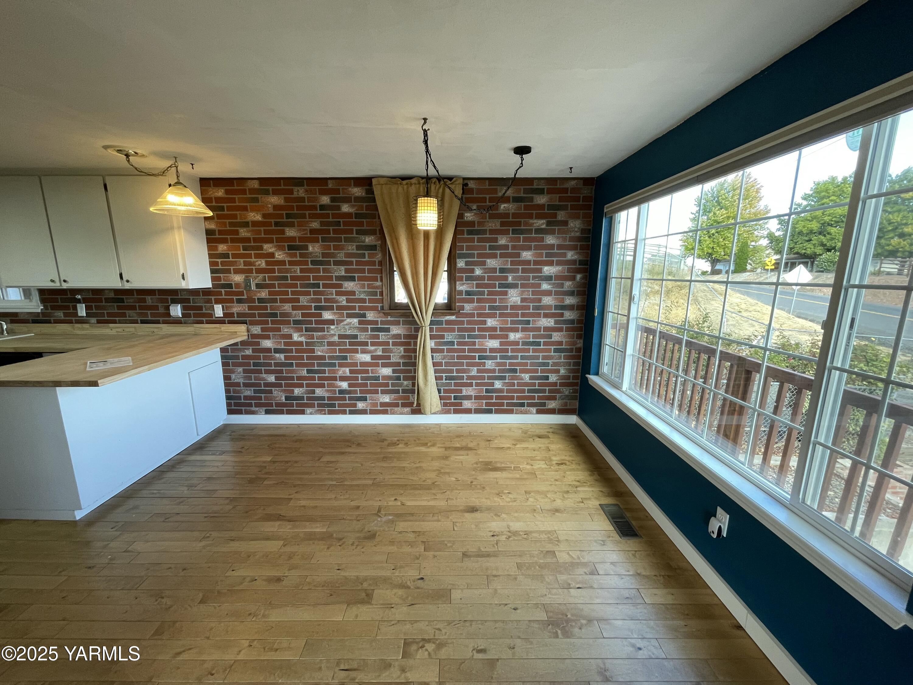 1602 Stein Road Yakima, WA 98908 - Photo 12 of 29 a view of a kitchen with a sink and cabinets