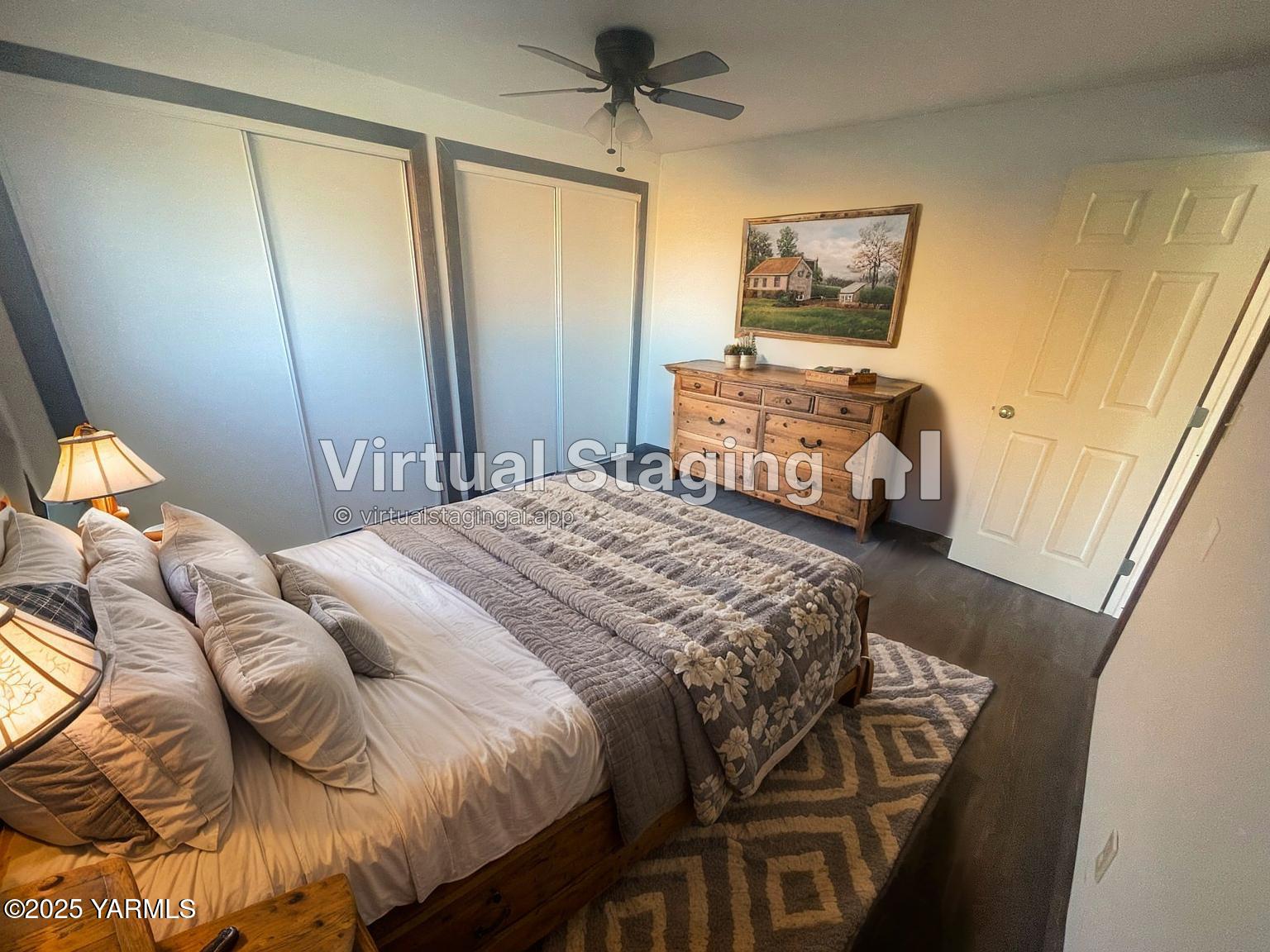 1602 Stein Road Yakima, WA 98908 - Photo 22 of 29 a bedroom with a bed and a painting on the wall