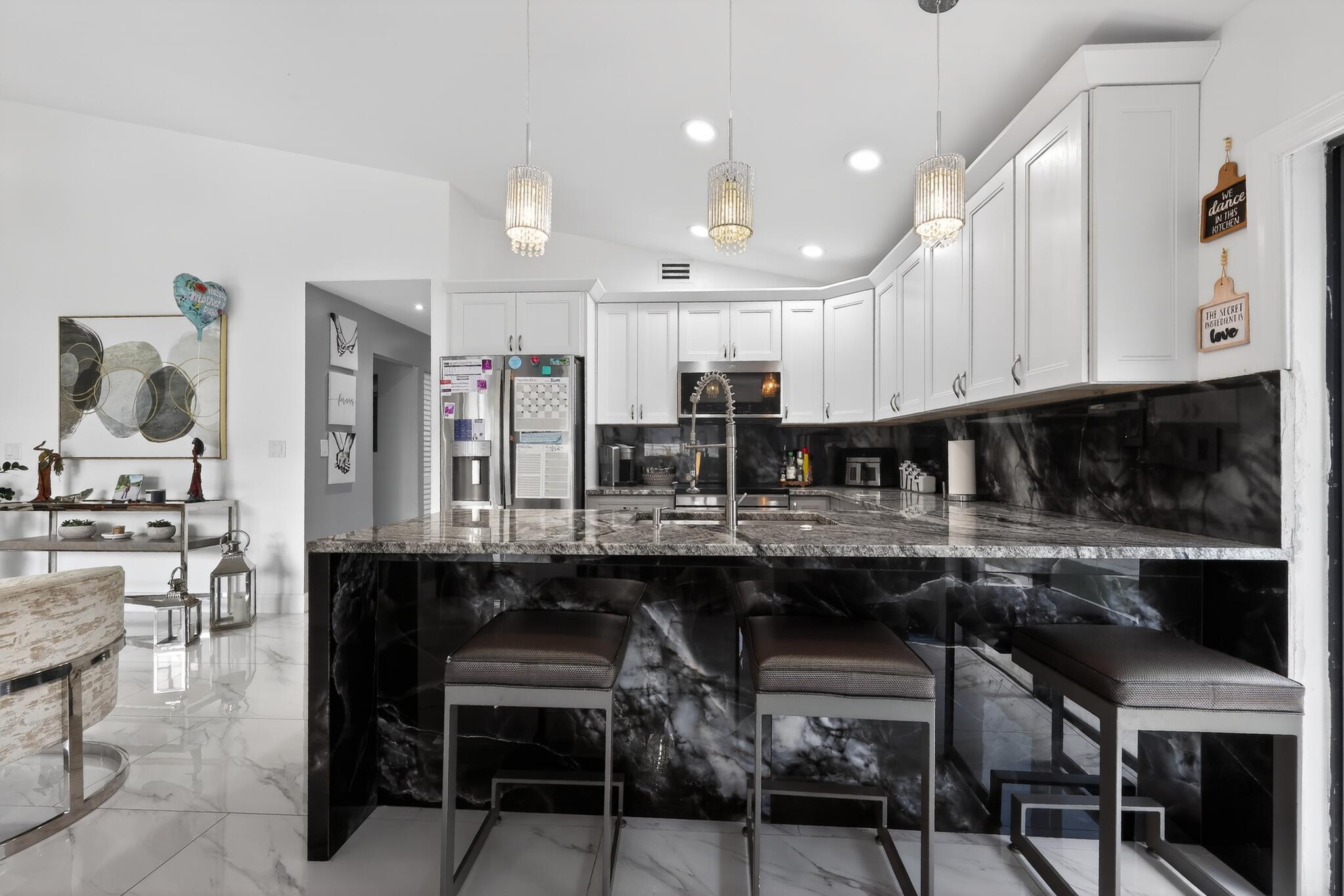 11423 Whisper Sound Drive Boca Raton, FL 33428 - Photo 22 of 39 19_11423_Whisper_Sound_Dr-Kitchen-0100