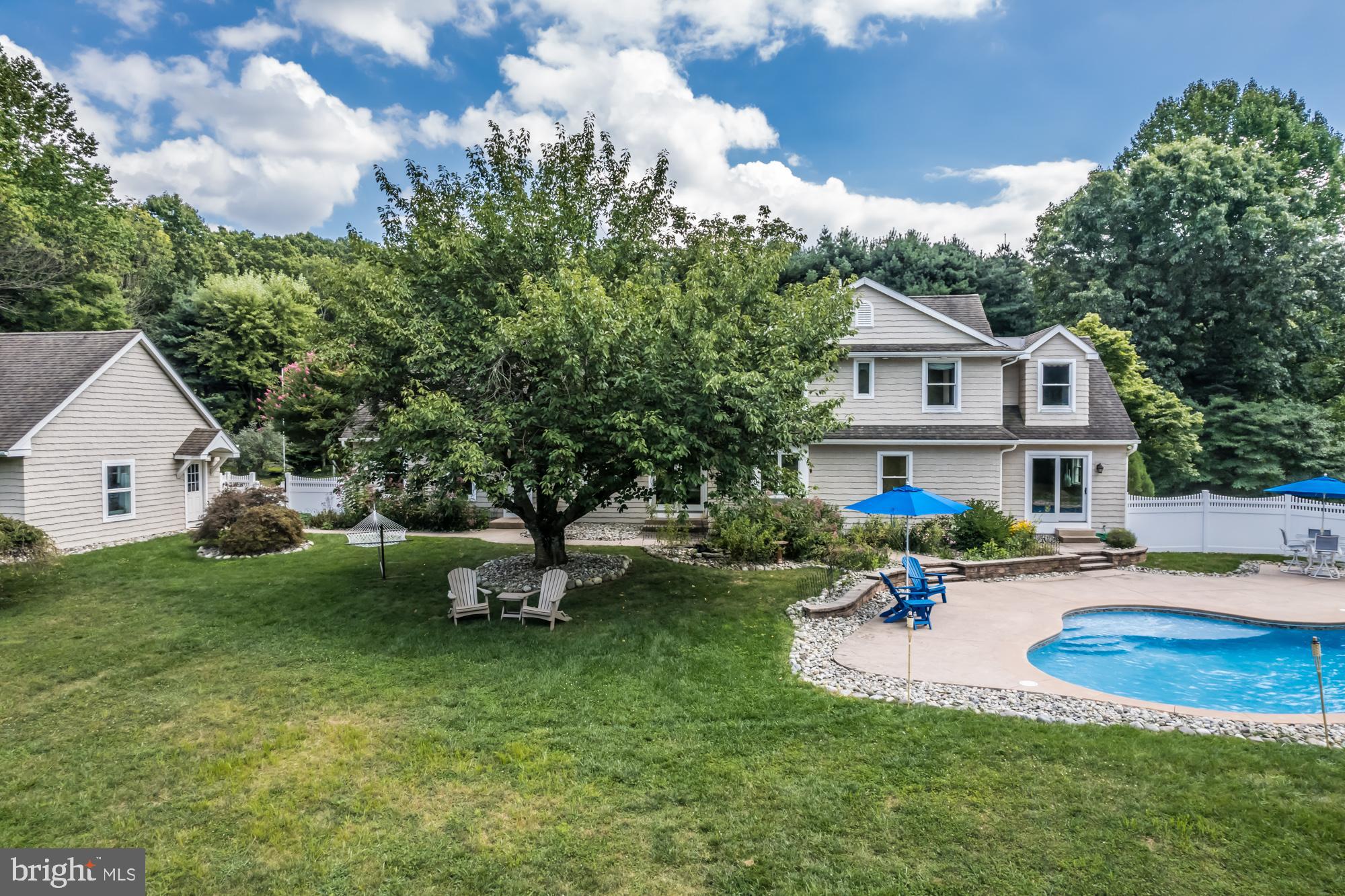 11 Hawk Hill Road Downingtown, PA 19335 - Photo 54 of 64 a view of a house with backyard and sitting area