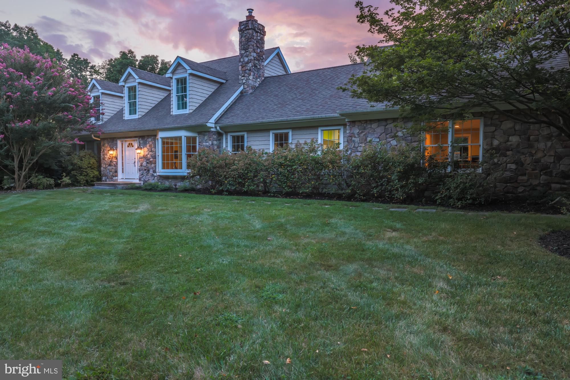 11 Hawk Hill Road Downingtown, PA 19335 - Photo 59 of 64 a front view of a house with a garden