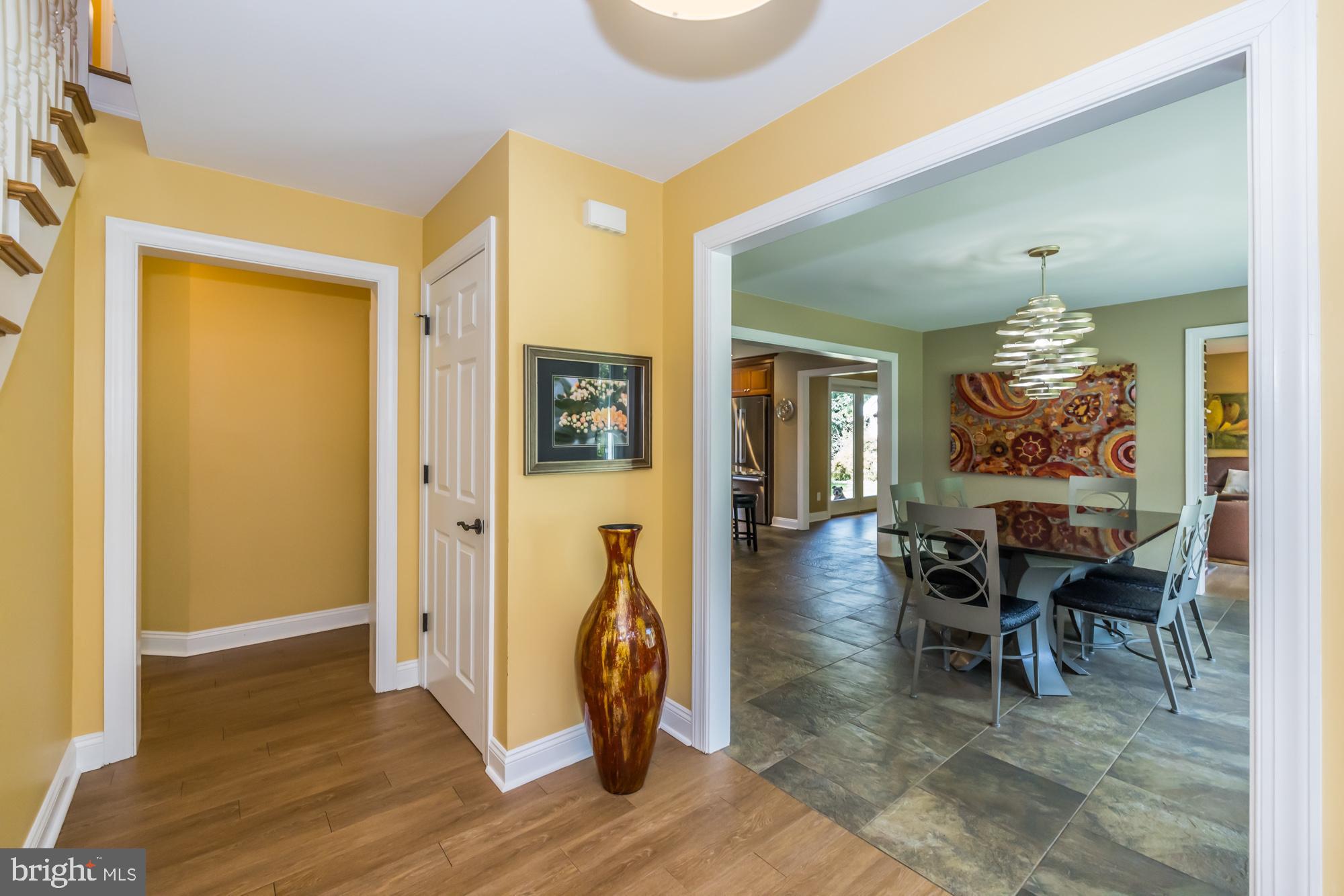11 Hawk Hill Road Downingtown, PA 19335 - Photo 6 of 64 a view of a dining room with furniture and chandelier