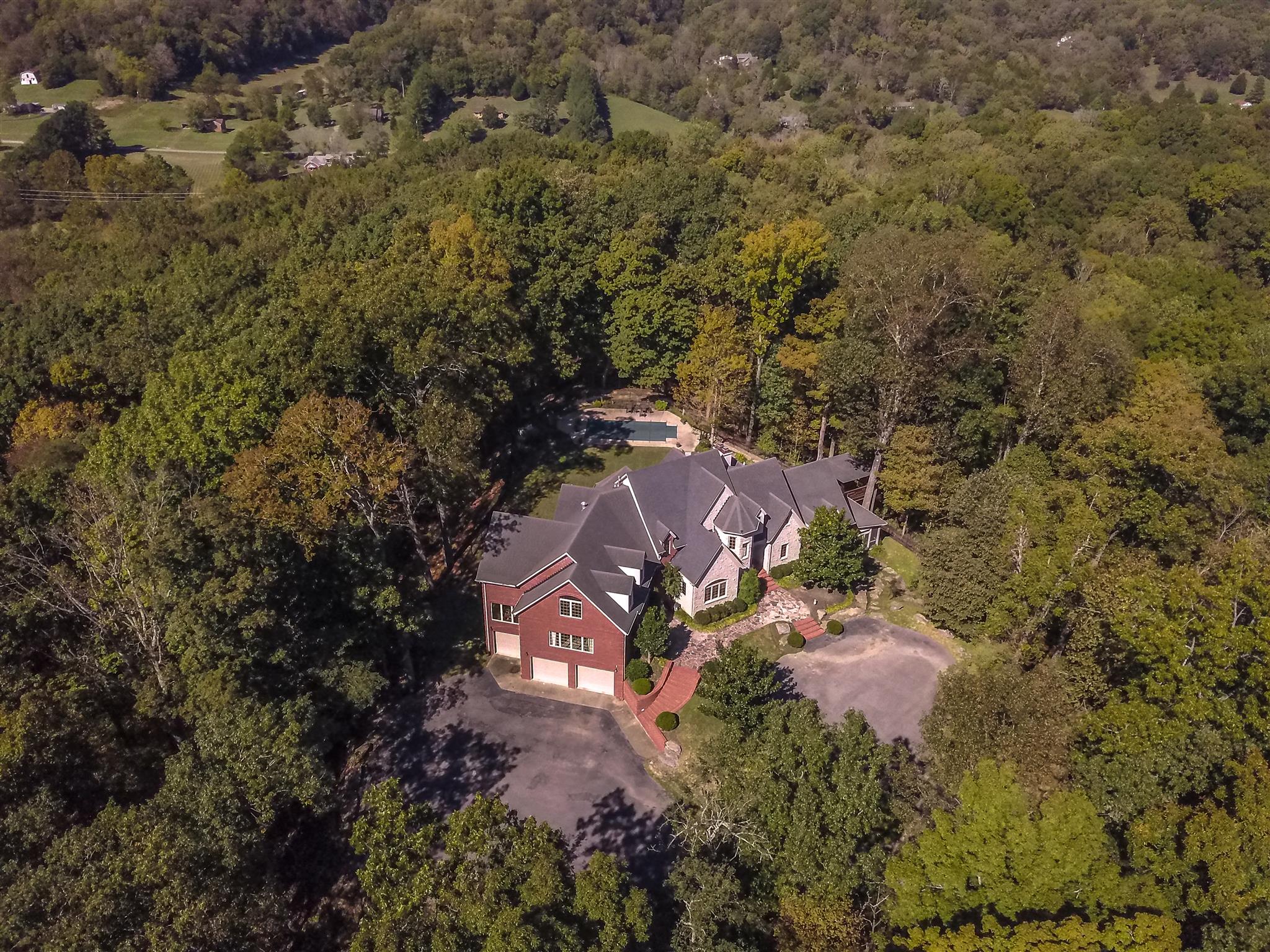 7446 River Rd Pike Nashville, TN 37209 - Photo 2 of 30 a view of a house with a yard