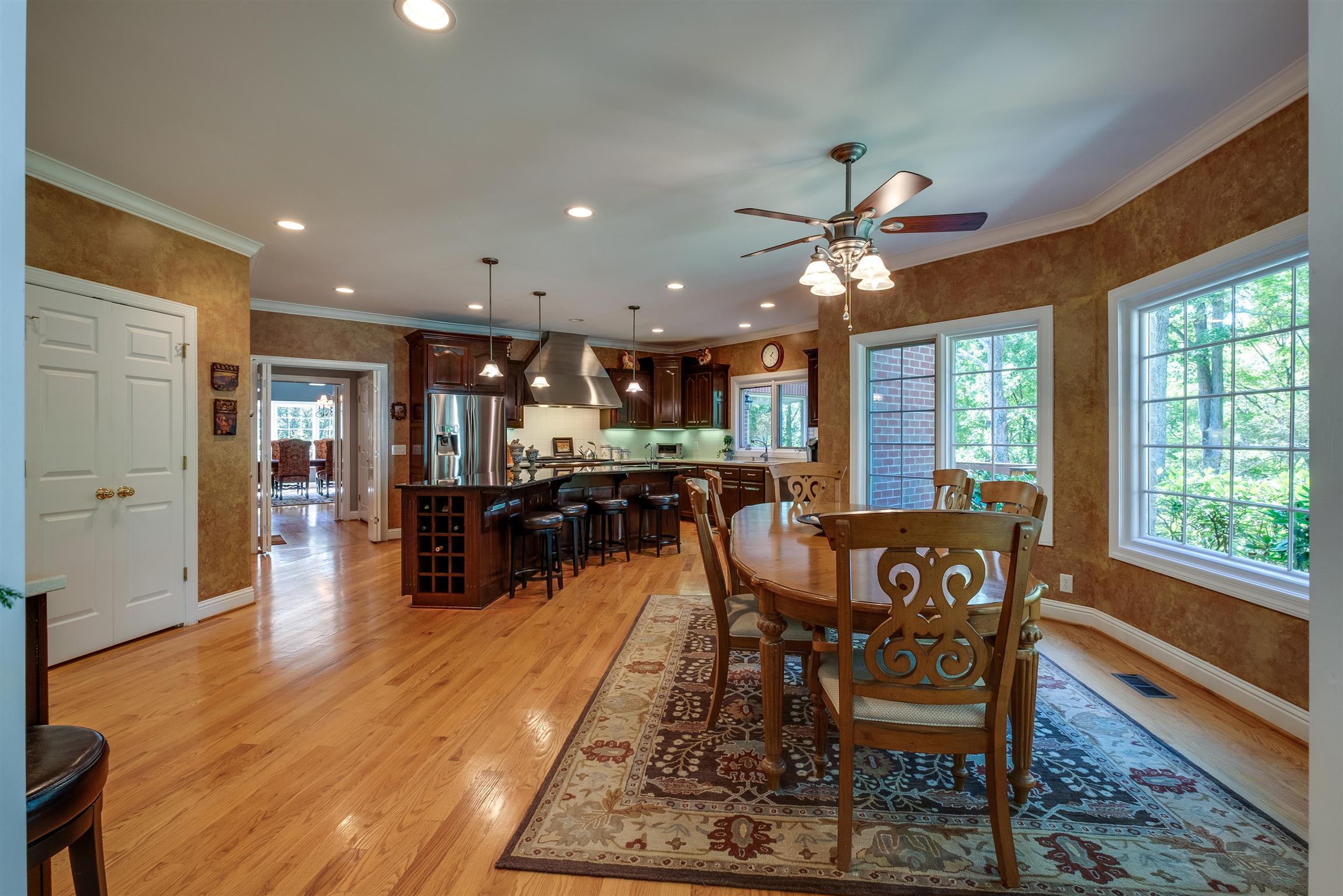 7446 River Rd Pike Nashville, TN 37209 - Photo 11 of 30 a view of a dining room with furniture window and wooden floor