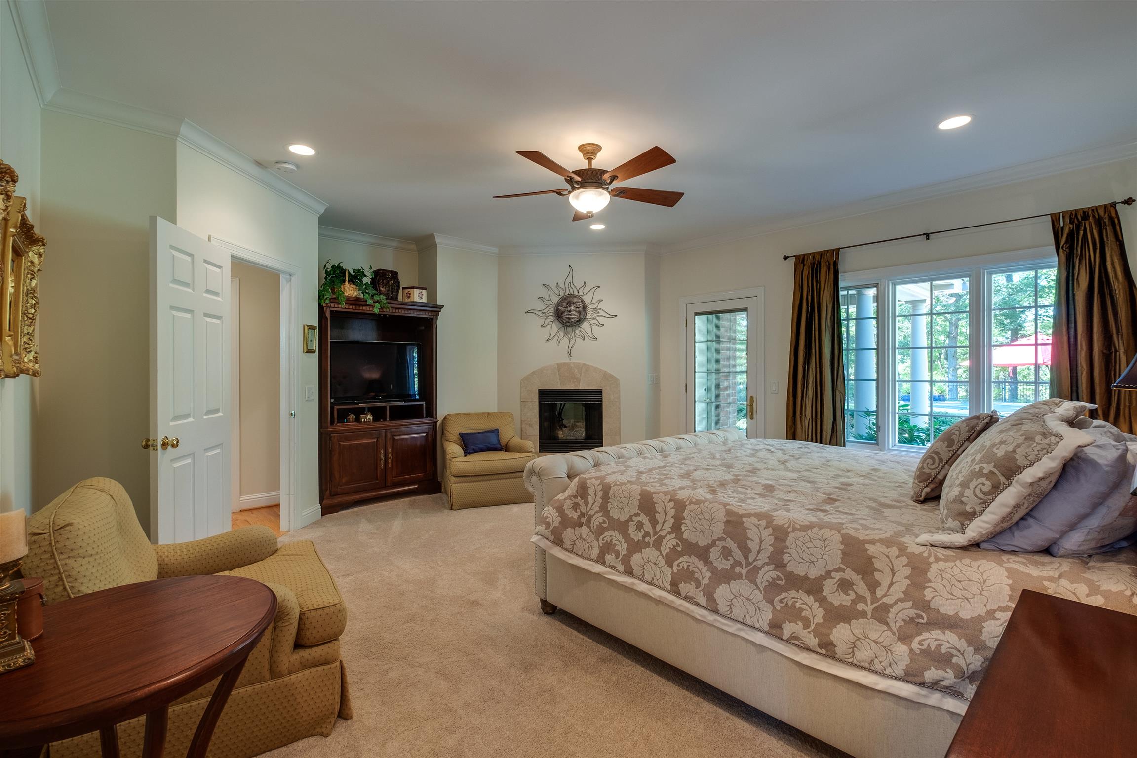 7446 River Rd Pike Nashville, TN 37209 - Photo 16 of 30 a bedroom with a bed dresser and a large window