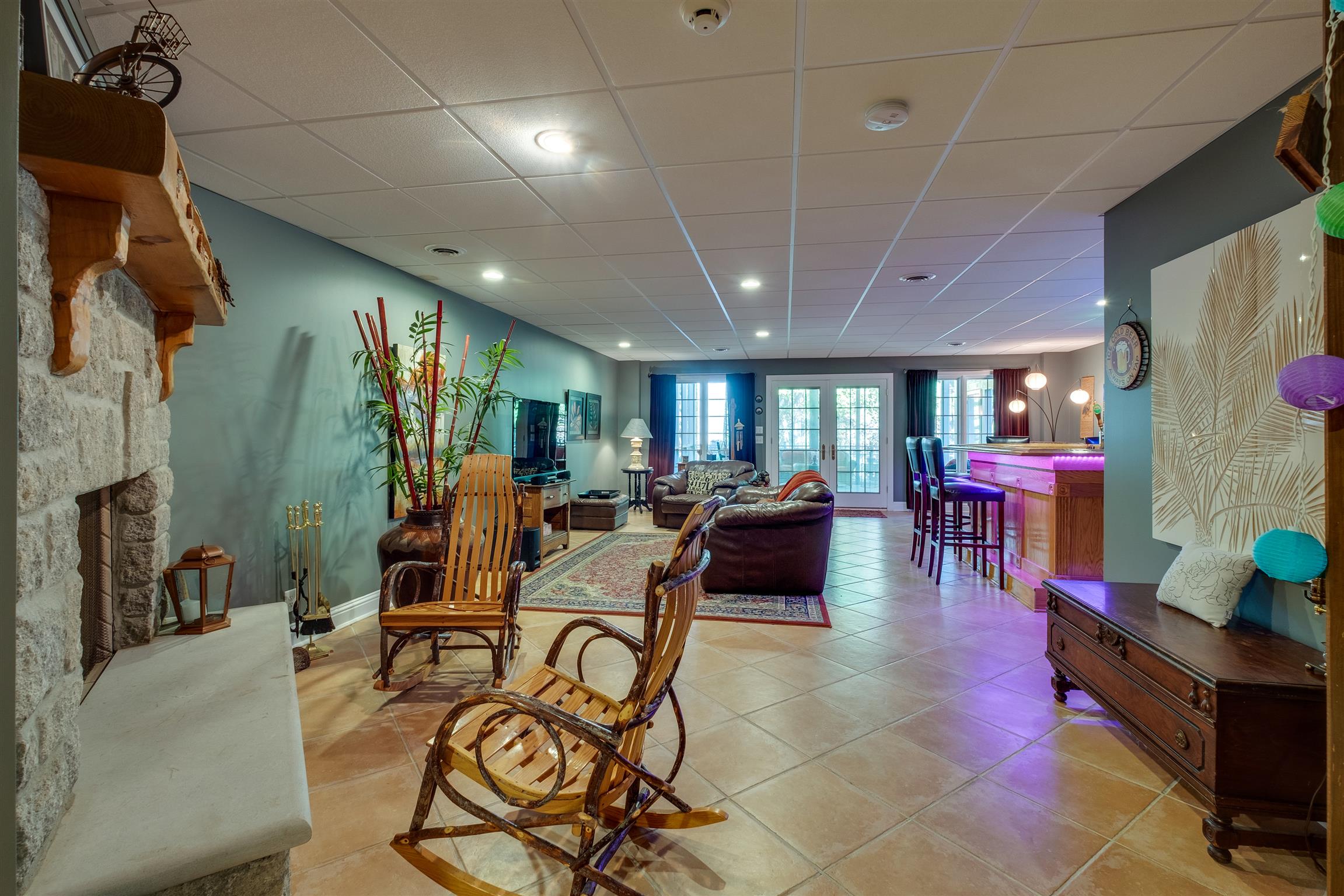 7446 River Rd Pike Nashville, TN 37209 - Photo 23 of 30 a living room with lots of furniture and a flat screen tv