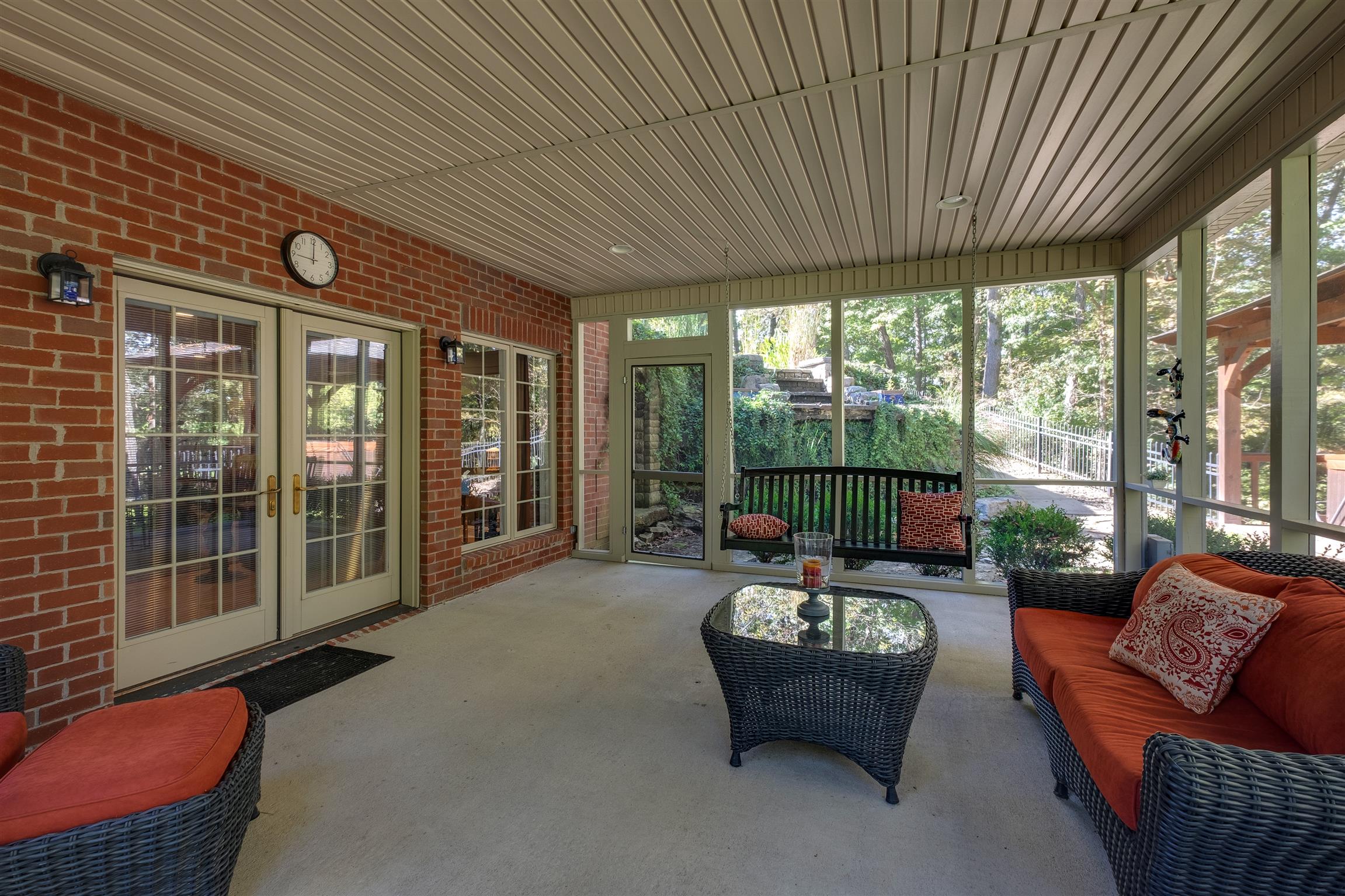 7446 River Rd Pike Nashville, TN 37209 - Photo 24 of 30 a balcony with furniture and large windows