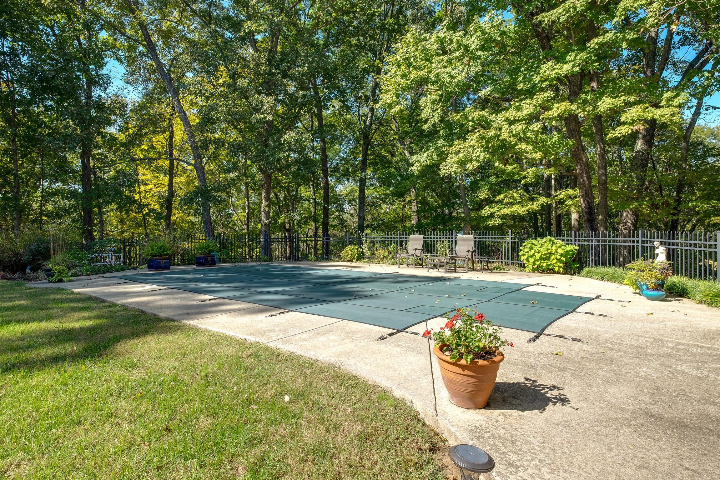 7446 River Rd Pike Nashville, TN 37209 - Photo 28 of 30 a view of a garden with potted plants