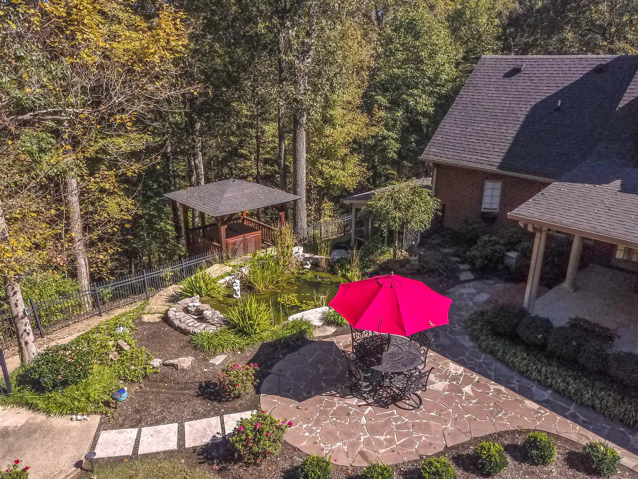 7446 River Rd Pike Nashville, TN 37209 - Photo 29 of 30 an outdoor space with furniture and umbrella