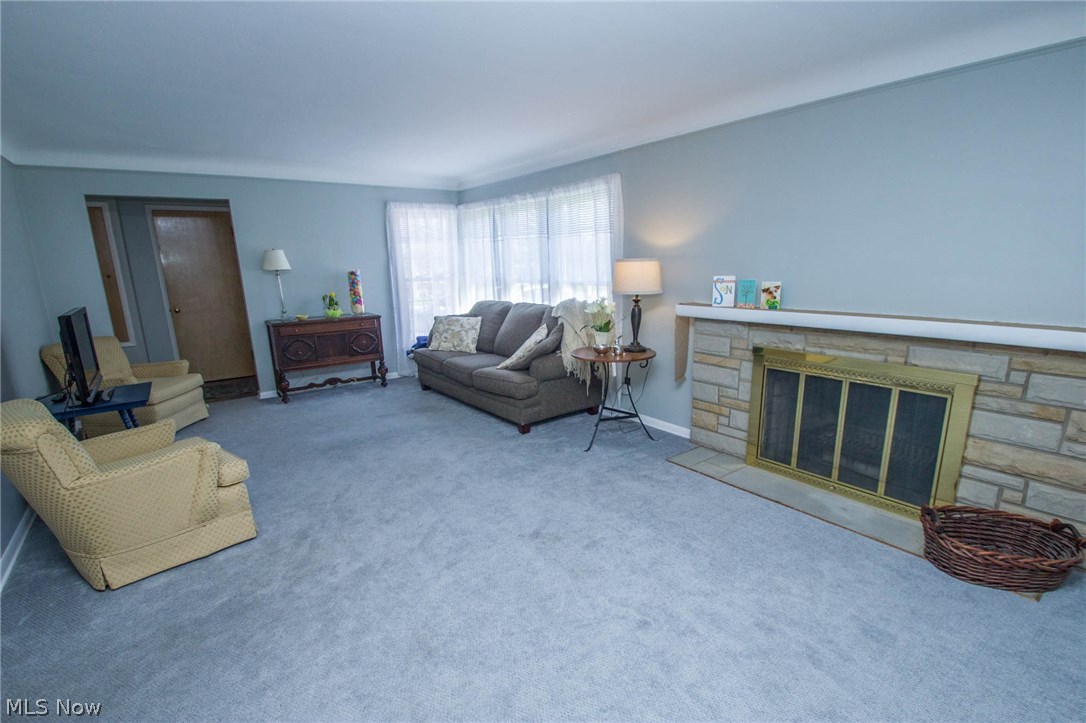 Spacious Living room with woodburning Fireplace!