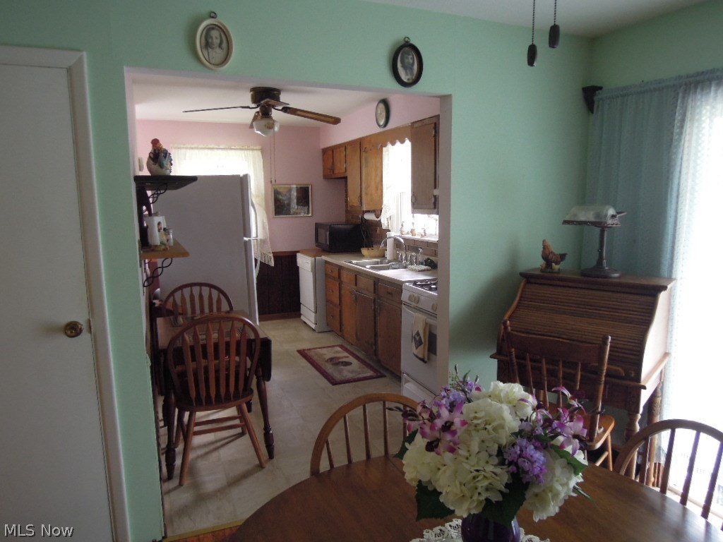 529 North Raccoon Road Youngstown, OH 44515 - Photo 13 of 24 Dining room has additional pantry storage off kitchen. Appliances stay.