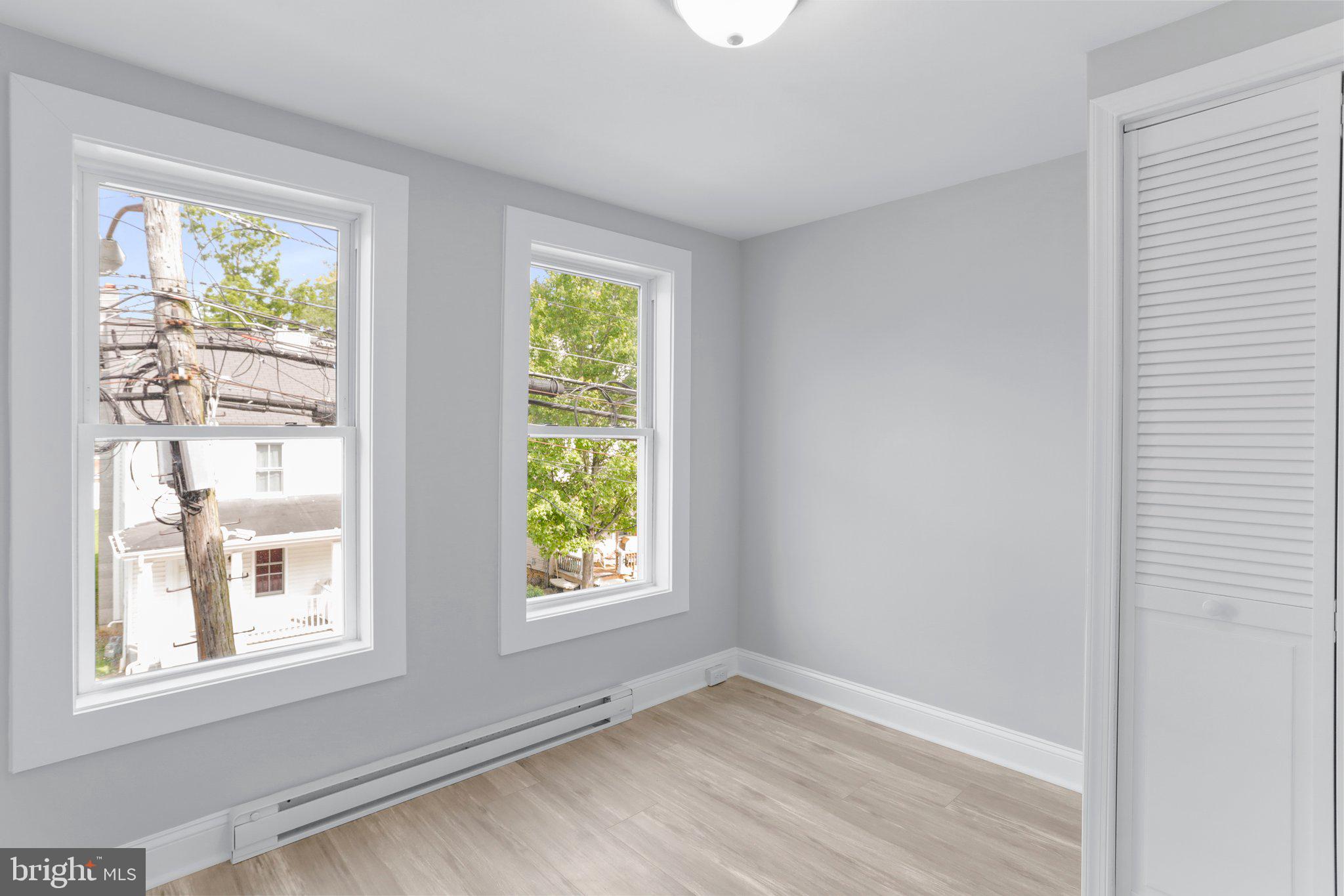 440 Jonathan Street, Unit A Hagerstown, MD 21740 - Photo 12 of 21 an empty room with windows