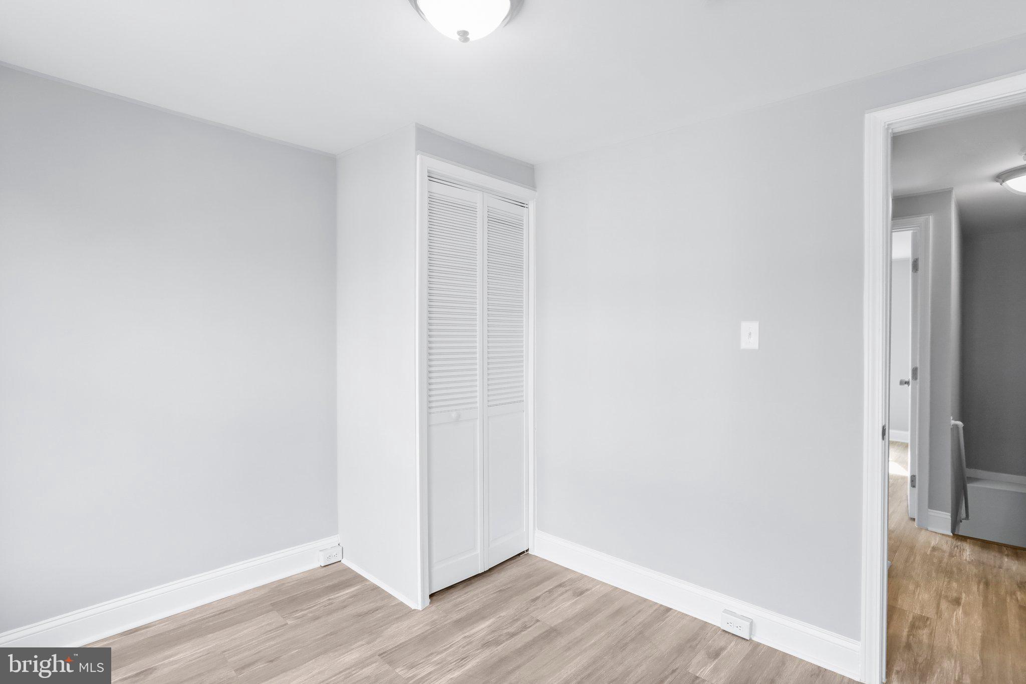 440 Jonathan Street, Unit A Hagerstown, MD 21740 - Photo 13 of 21 a view of a small space with wooden floor