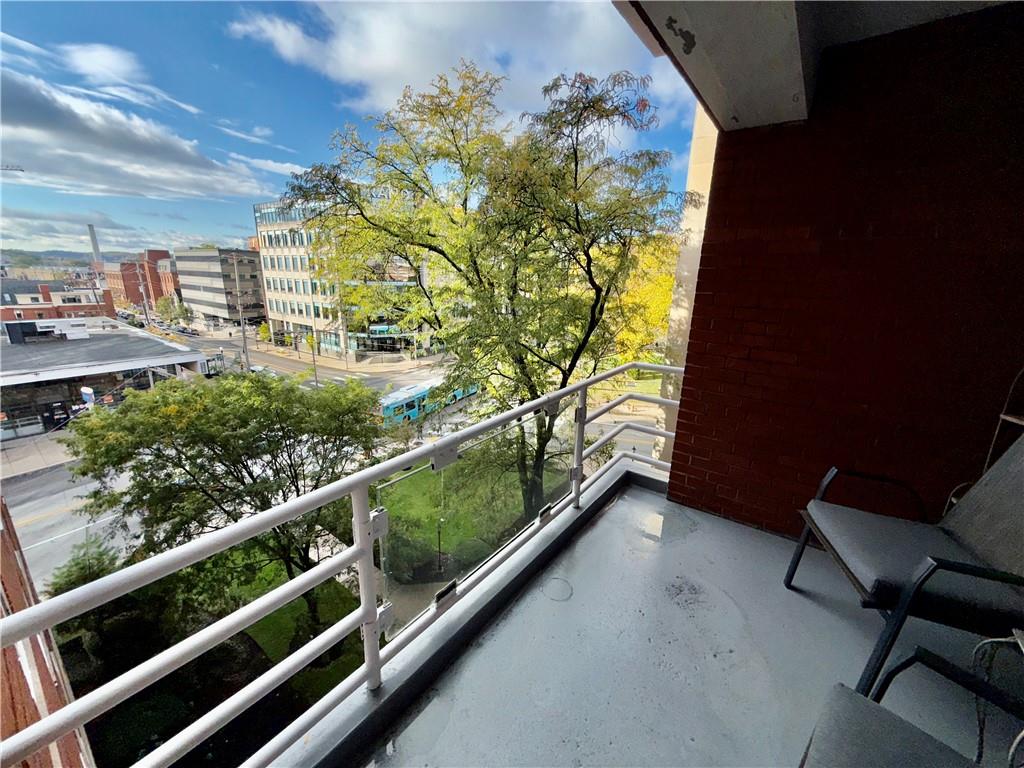 4601 Fifth Avenue, Unit 521 Pittsburgh, PA 15213 - Photo 8 of 13 a view of a balcony with chairs