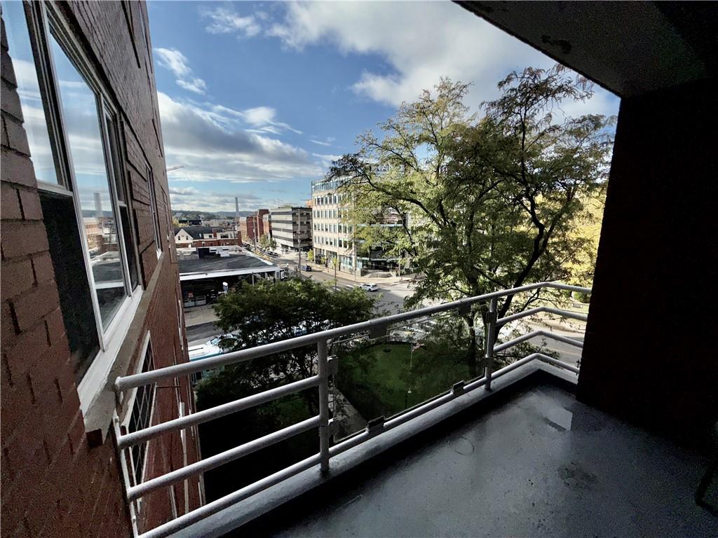 4601 Fifth Avenue, Unit 521 Pittsburgh, PA 15213 - Photo 9 of 13 a view of balcony with lots of trees