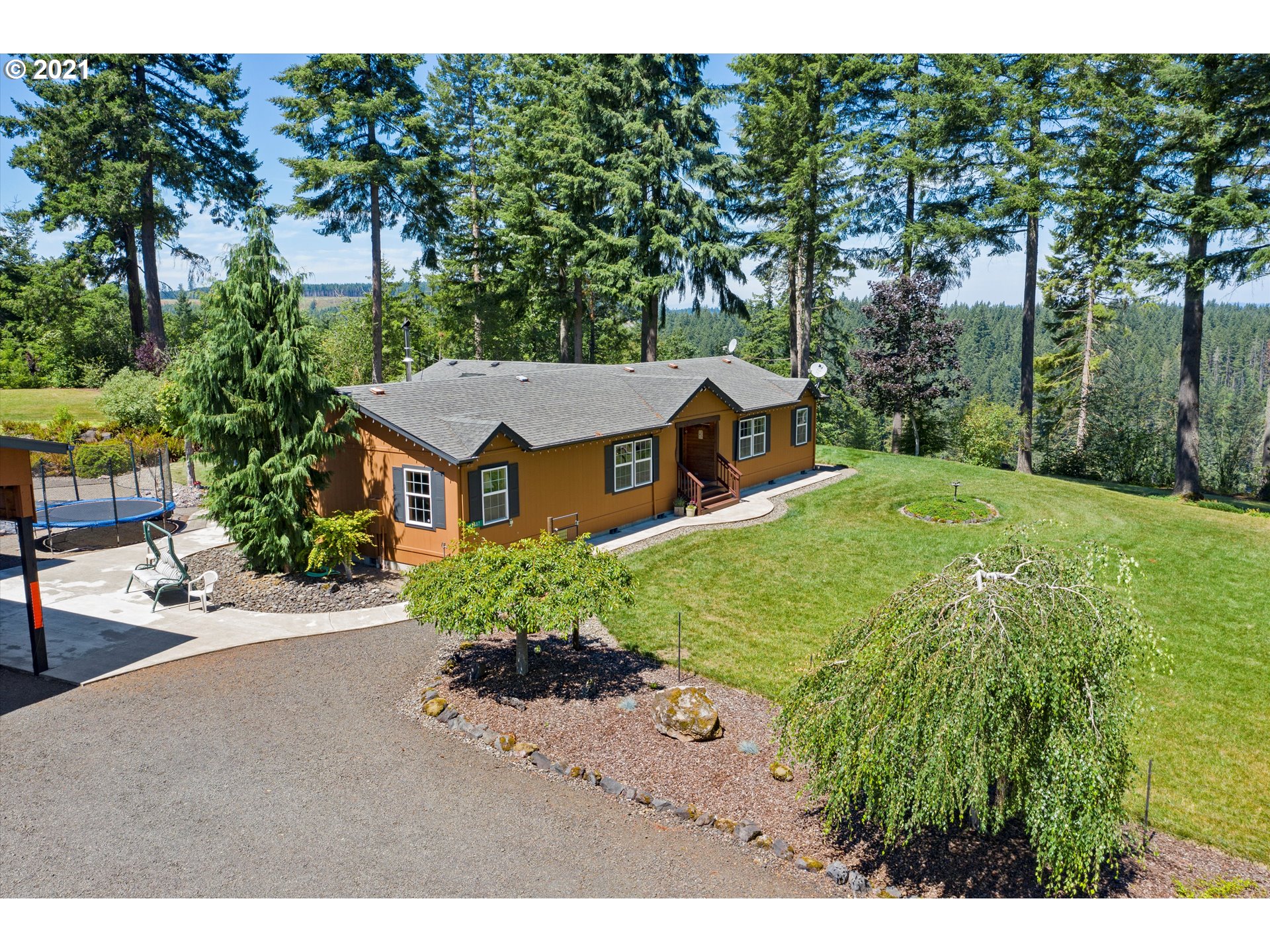 19887 South Mosier Road Oregon City, OR 97045 - Photo 2 of 22 a aerial view of a house with garden