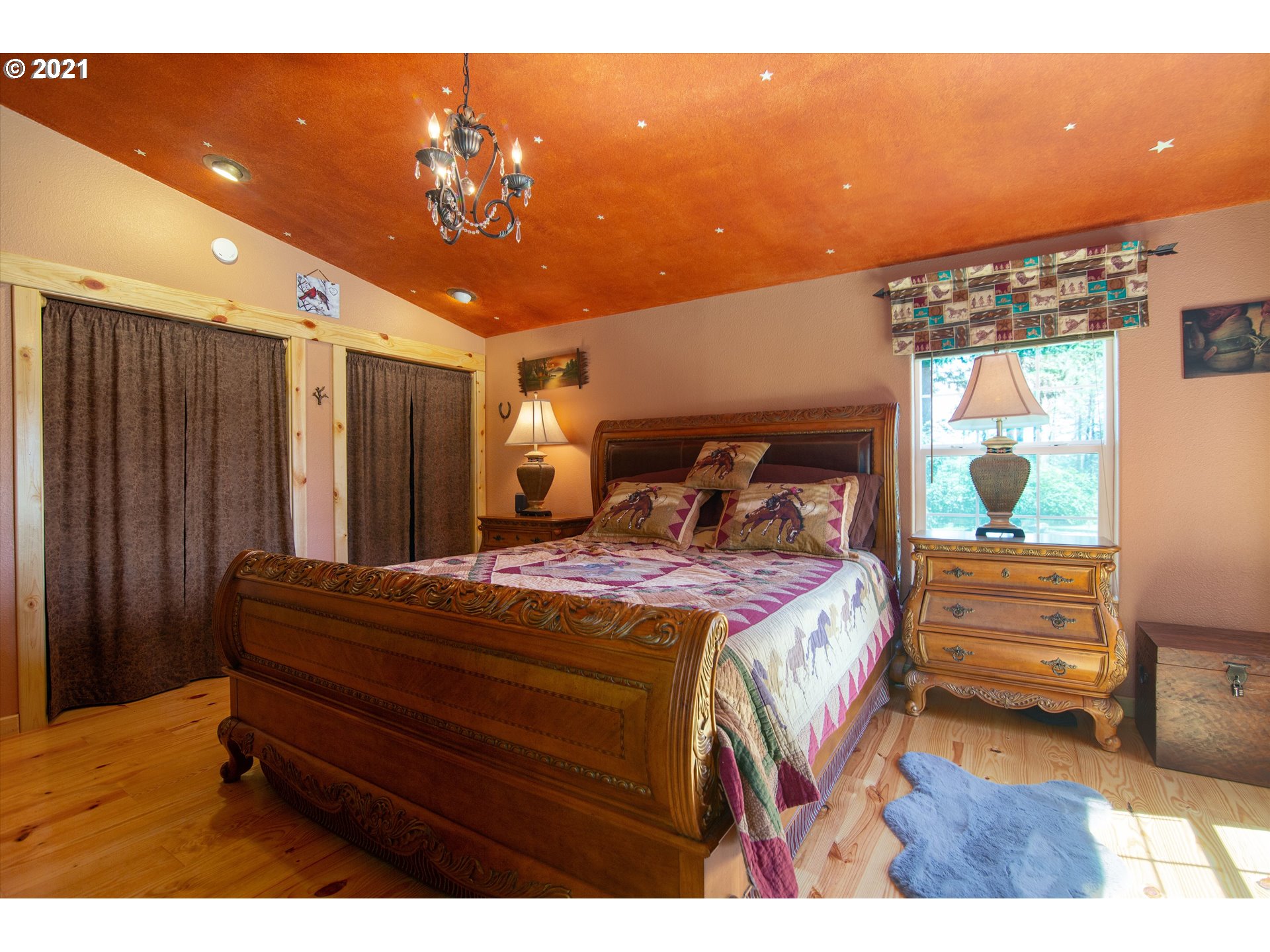 19887 South Mosier Road Oregon City, OR 97045 - Photo 15 of 22 a bedroom with a bed and a night stand