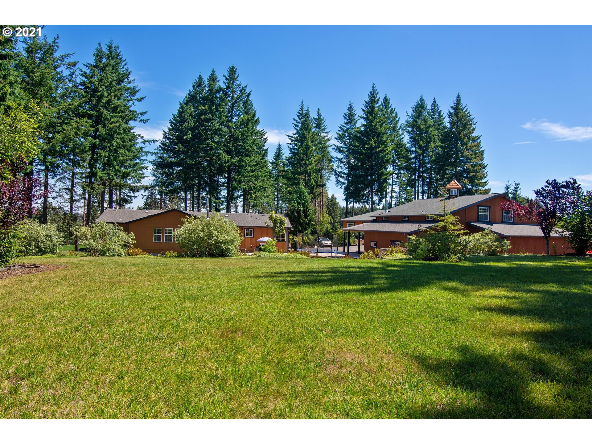 19887 South Mosier Road Oregon City, OR 97045 - Photo 22 of 22 a front view of a house with garden