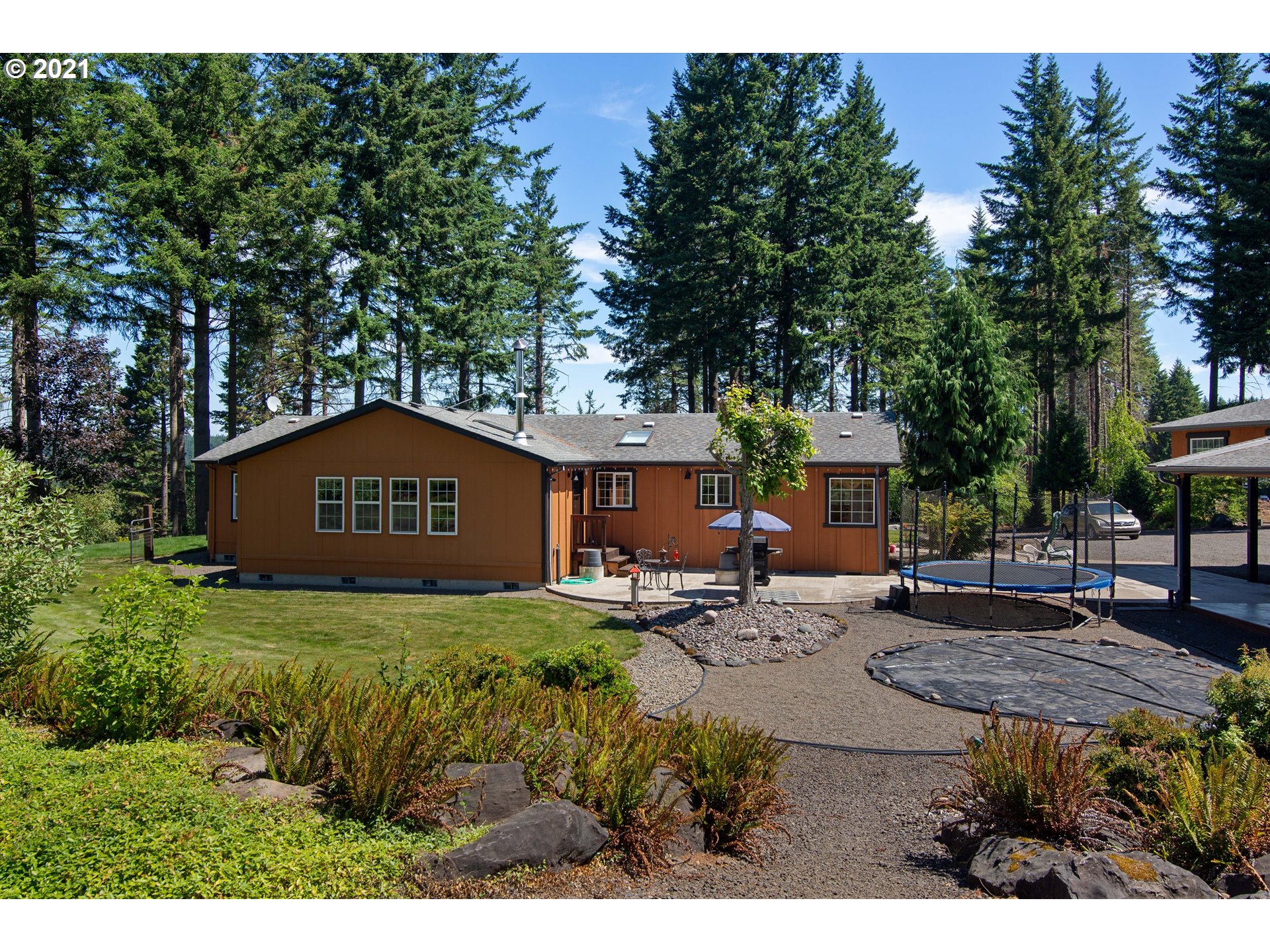 19887 South Mosier Road Oregon City, OR 97045 - Photo 6 of 22 a view of a house with a yard