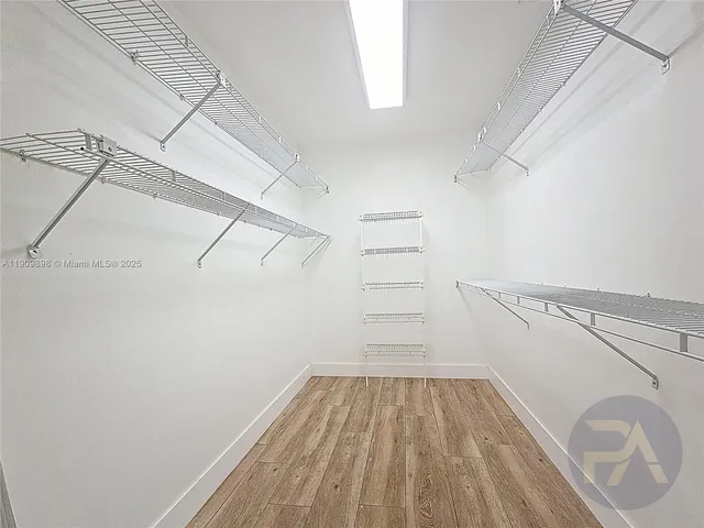 a view of a room with racks on the wall