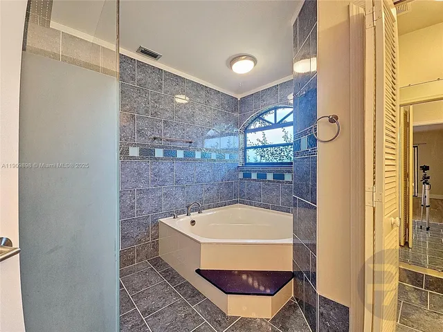 a bathroom with a sink and a bathtub