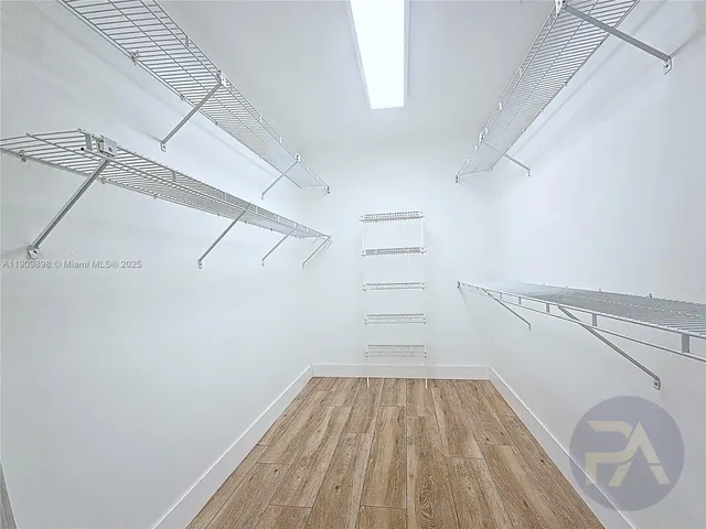 a view of a room with racks on the wall