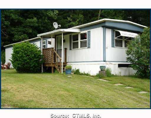 73 R And R Park Killingly, CT 06239 - Photo 1 of 1 a front view of a house with a yard