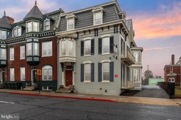a front view of a building with street view