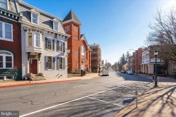a front view of a building with street view
