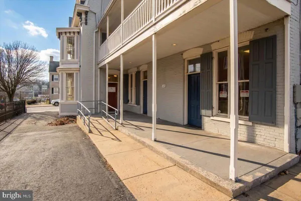 a view of a building with glass door