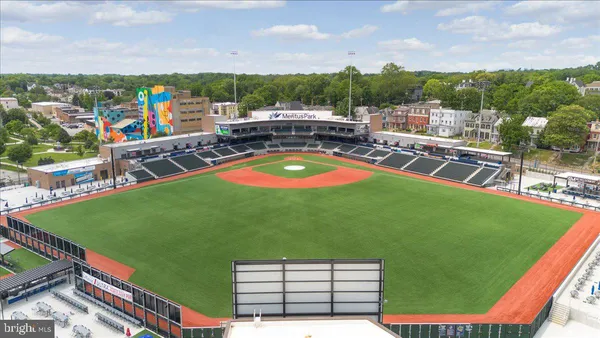 an aerial view of residential houses and outdoor space