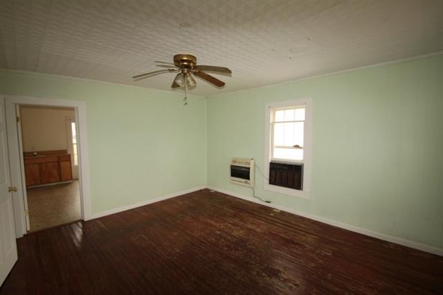 185 Brighton Road Flintville, TN 37335 - Photo 7 of 10 Reenter the living room to head into your kitchen.