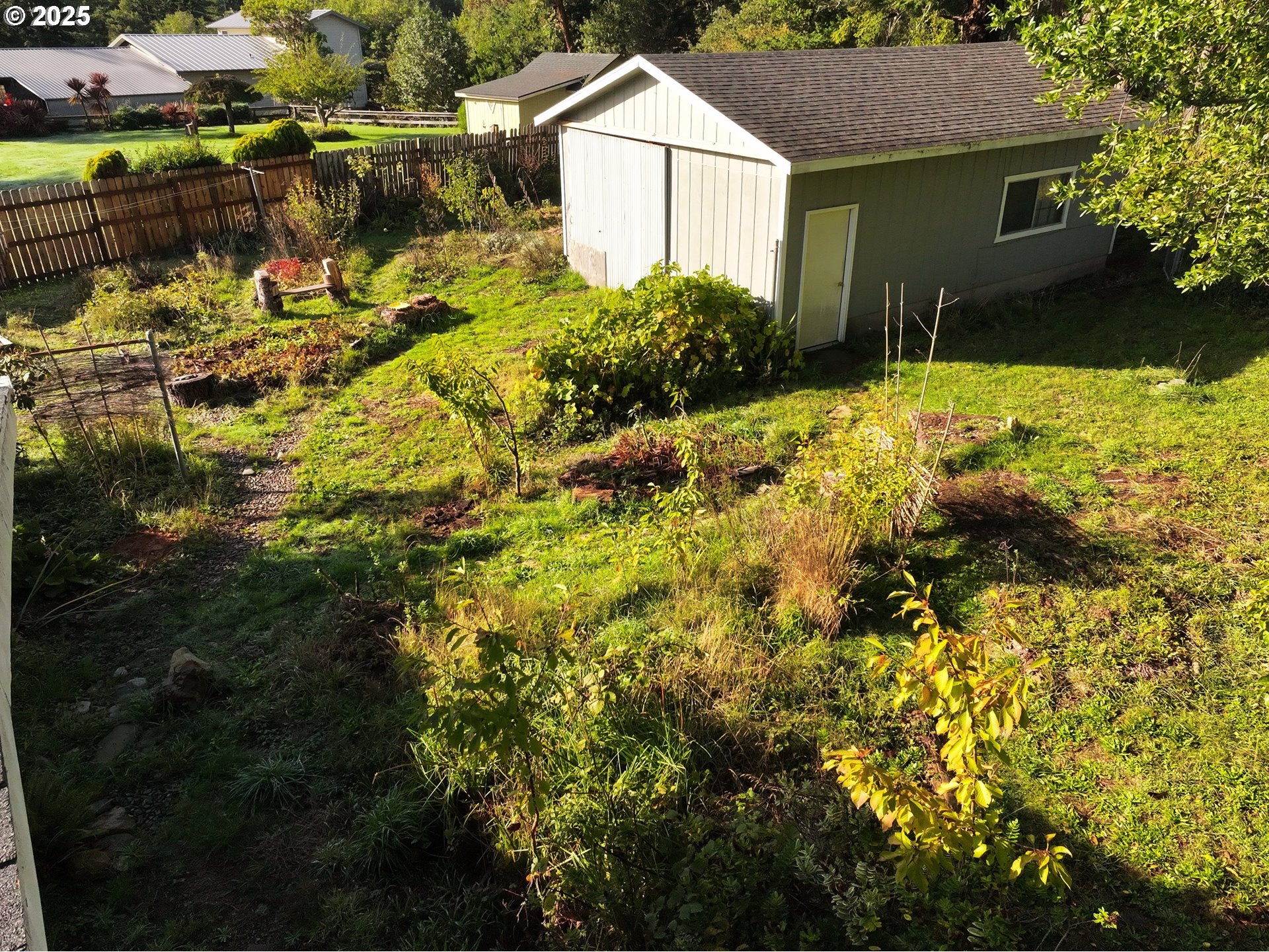 2537 Port Orford Loop Road Port Orford, OR 97465 - Photo 11 of 32 a view of house with garden