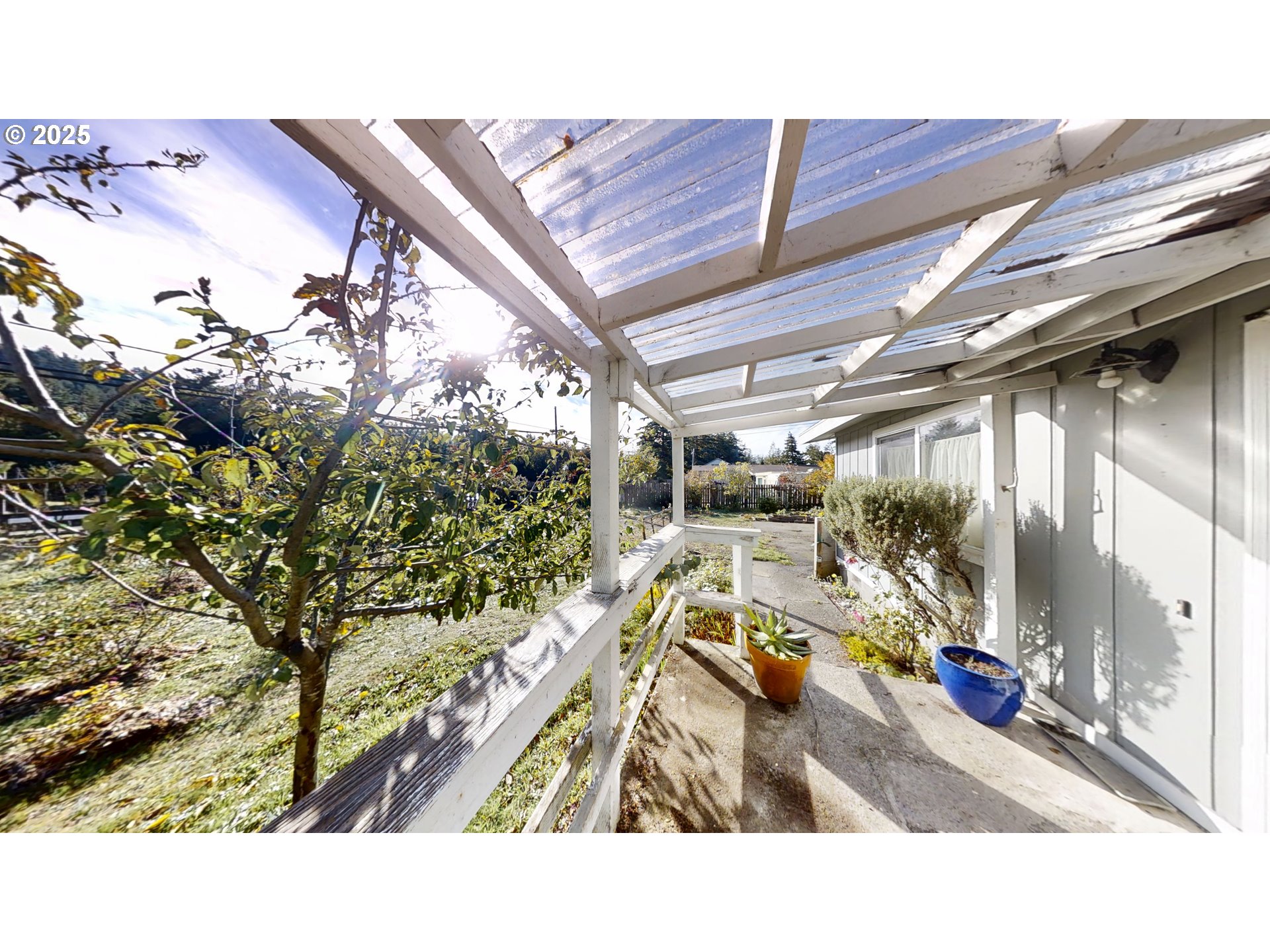 2537 Port Orford Loop Road Port Orford, OR 97465 - Photo 14 of 32 a view of a chairs and table in a patio