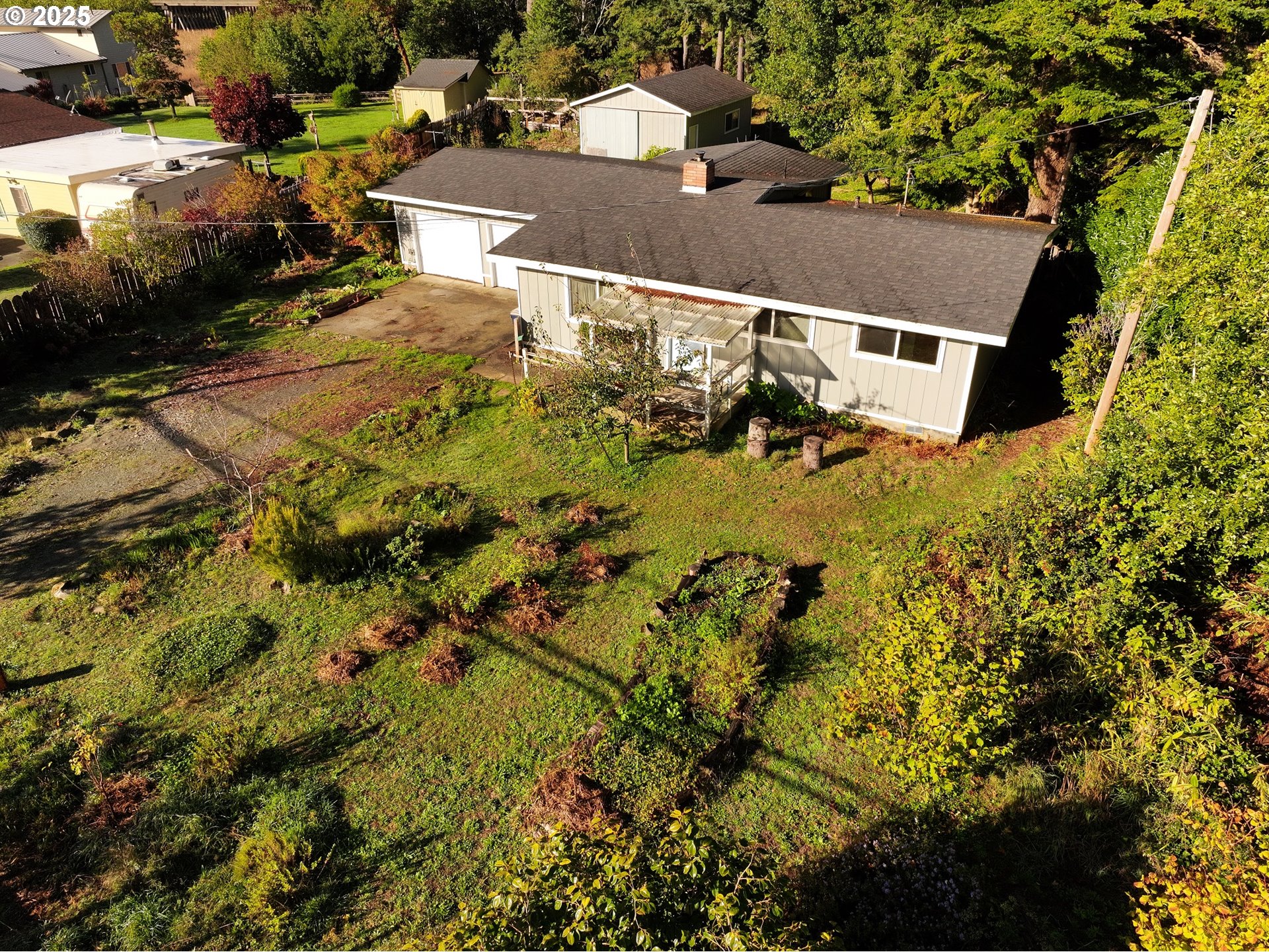 2537 Port Orford Loop Road Port Orford, OR 97465 - Photo 2 of 32 an aerial view of residential houses with outdoor space