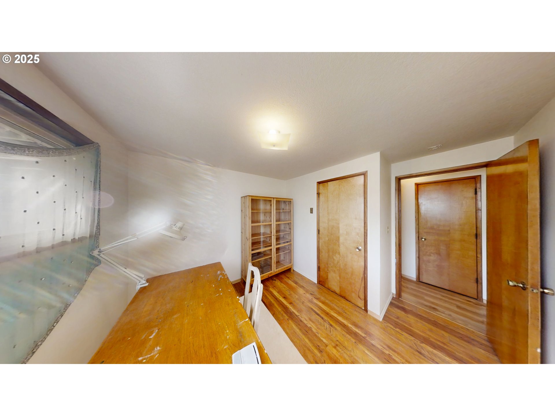 2537 Port Orford Loop Road Port Orford, OR 97465 - Photo 23 of 32 a en suite bathroom with sink and mirror
