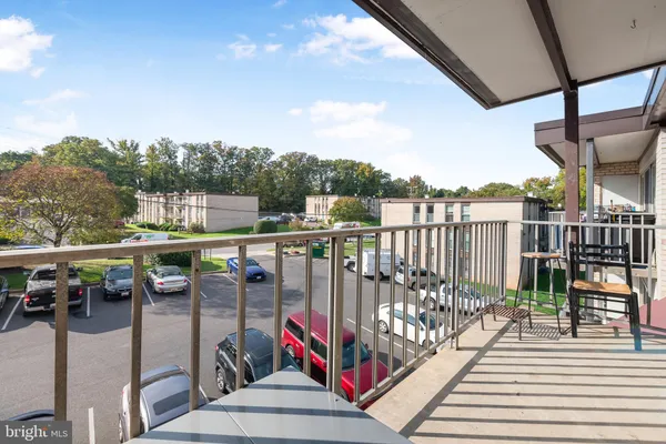 a utility room with sink dryer and washer