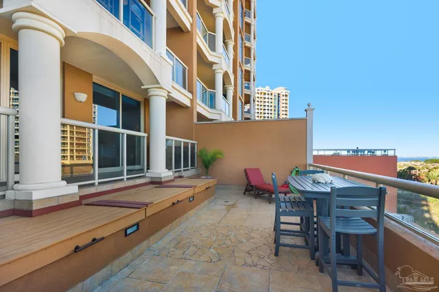 a view of a terrace with sitting area