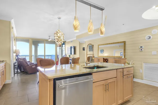 a very nice looking dining room with a chandelier
