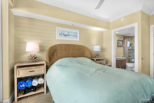 a bedroom with a bed and a table in it