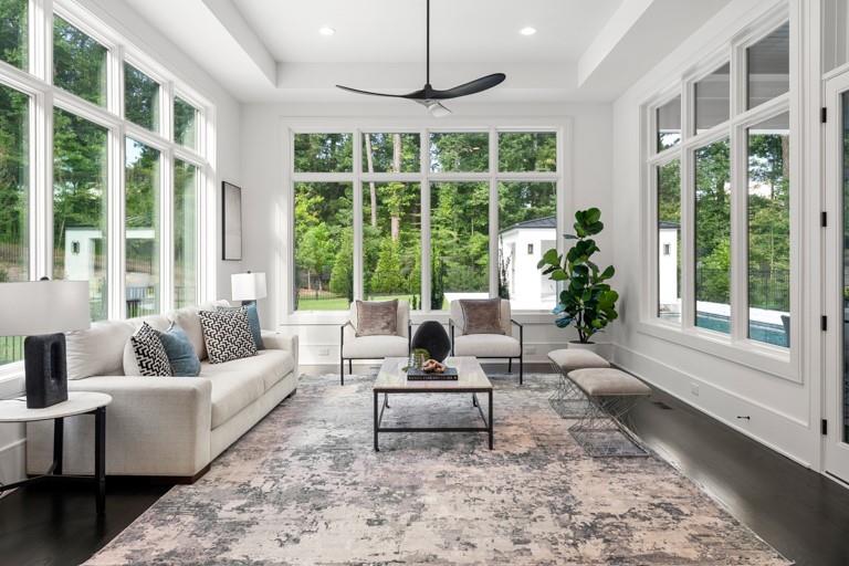 5211 Powers Ferry Road Northwest Sandy Springs, GA 30327 - Photo 31 of 106 a living room with furniture and a large window