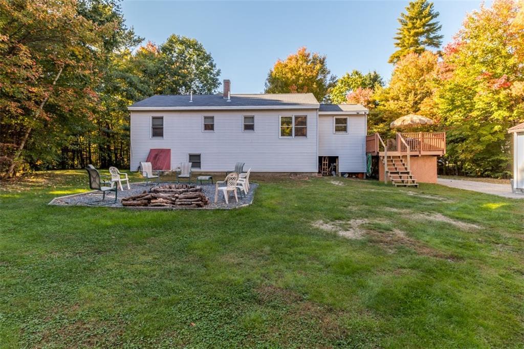 14 Deer Acres Road Standish, ME 04084 - Photo 3 of 30 Back exterior, large level backyard,...
