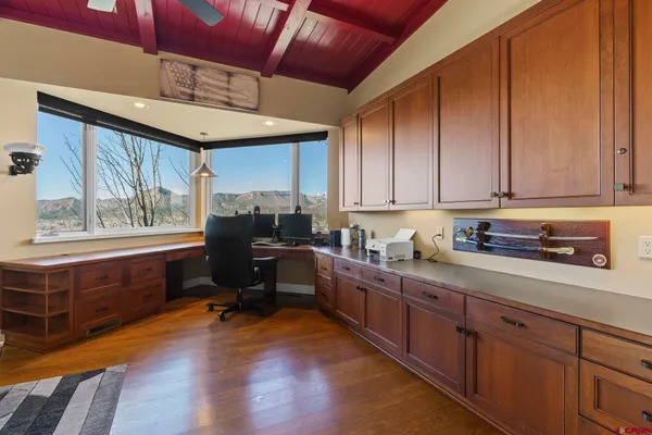 a kitchen with sink cabinets and window