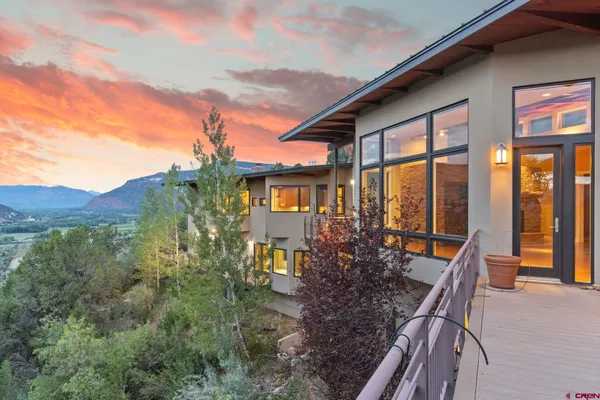a front view of a house with patio