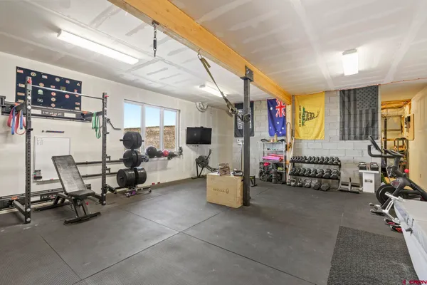 a view of a room with gym equipment