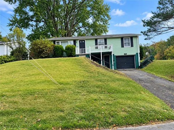a house with trees in front of it